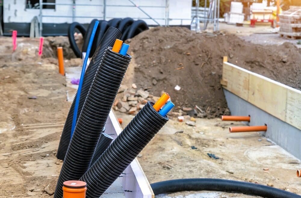 underground conduits buried in the ground to protect cables and pipes